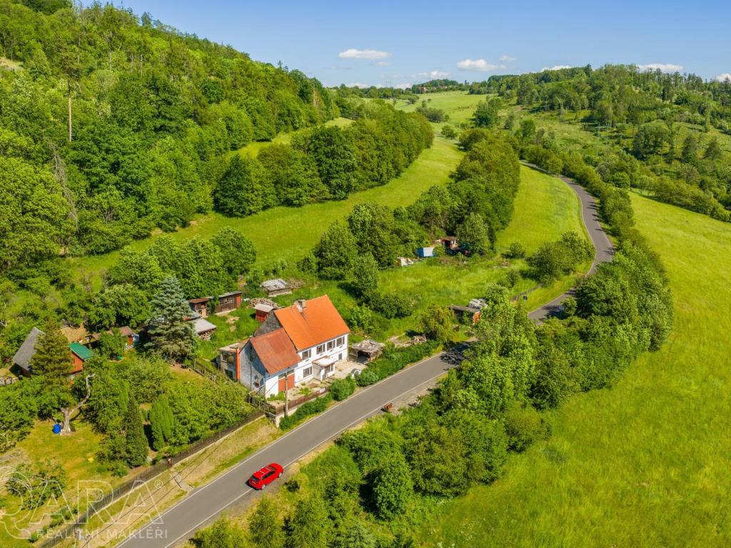 Prodej domu 205 m² – pohled 2